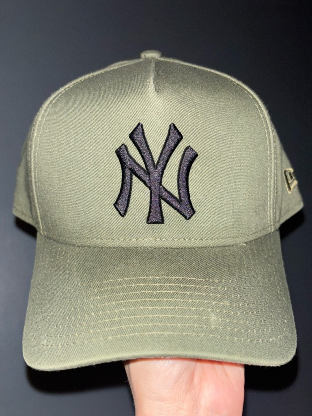 Genuine Merchandise Olive Green New York Baseball Cap with Black Logo